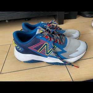 Blue and gray New Balance. Big Kids size 6Wide